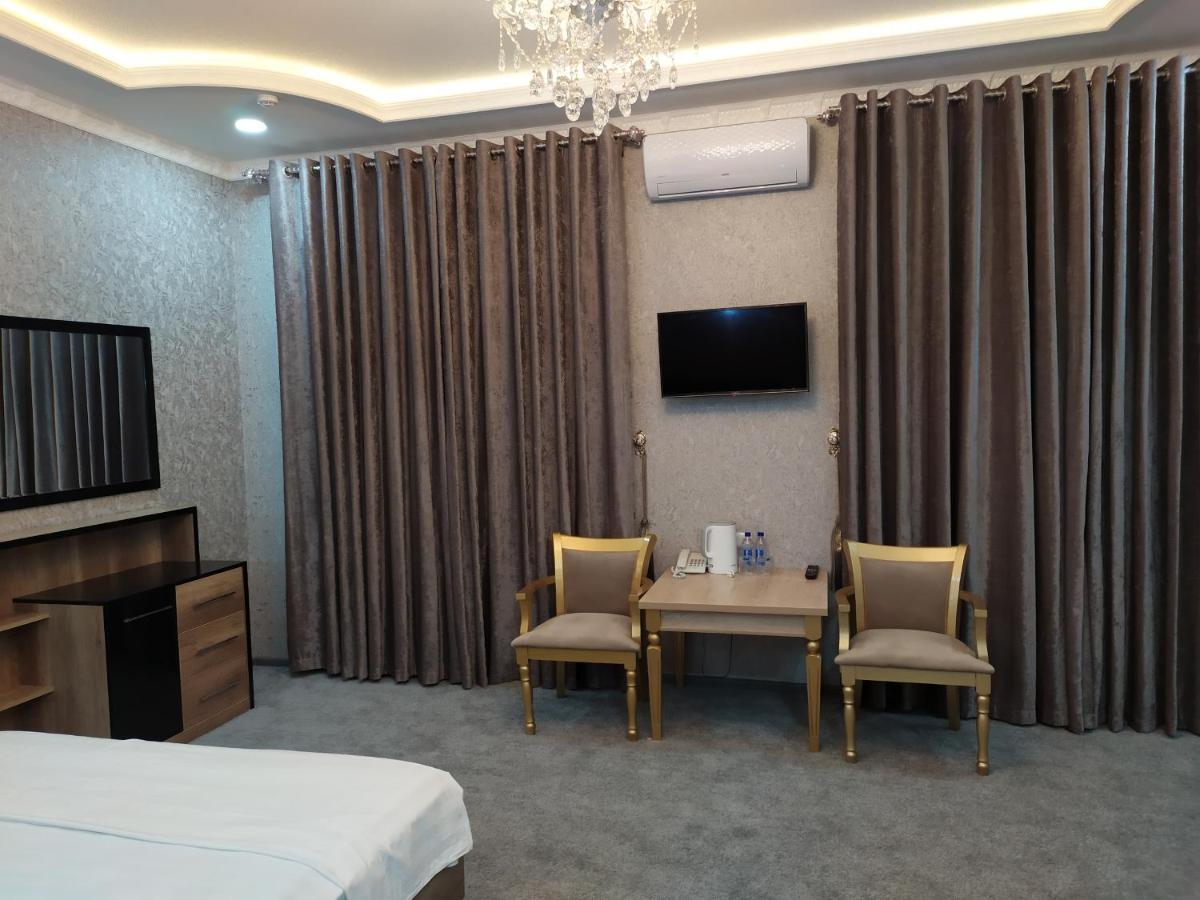 Diyor Hotel Marghilon Eksteriør bilde
