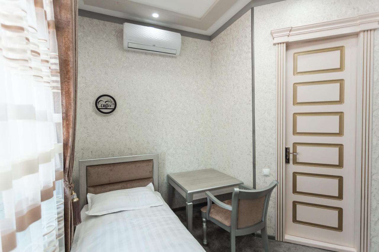 Diyor Hotel Marghilon Eksteriør bilde