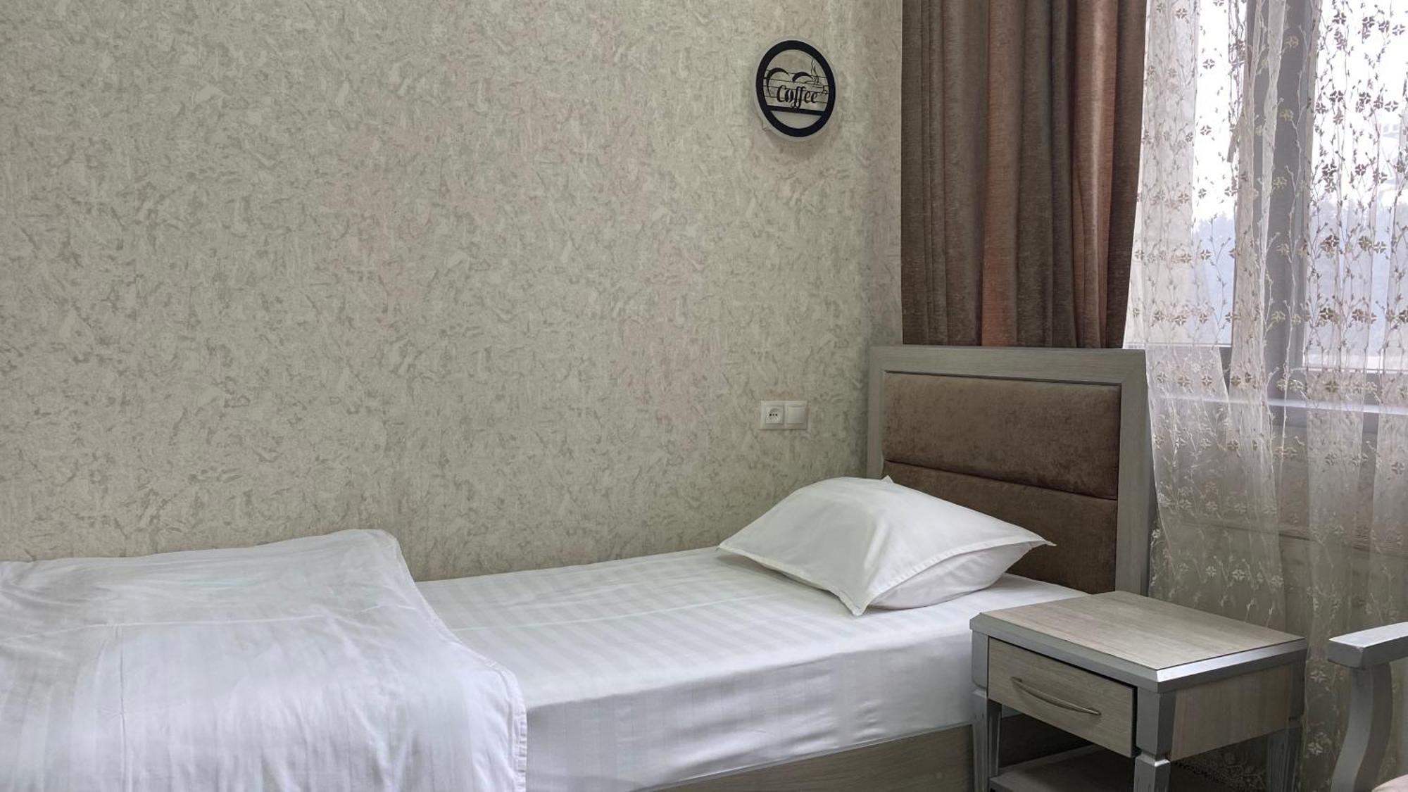 Diyor Hotel Marghilon Eksteriør bilde