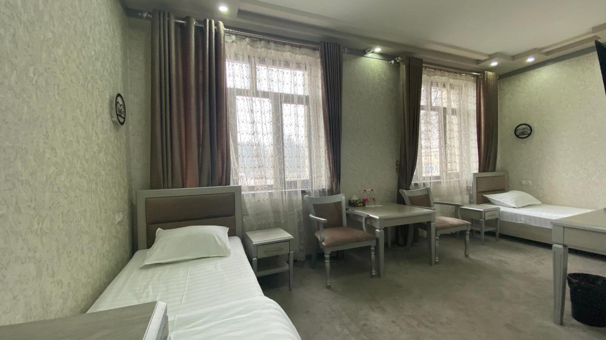Diyor Hotel Marghilon Eksteriør bilde