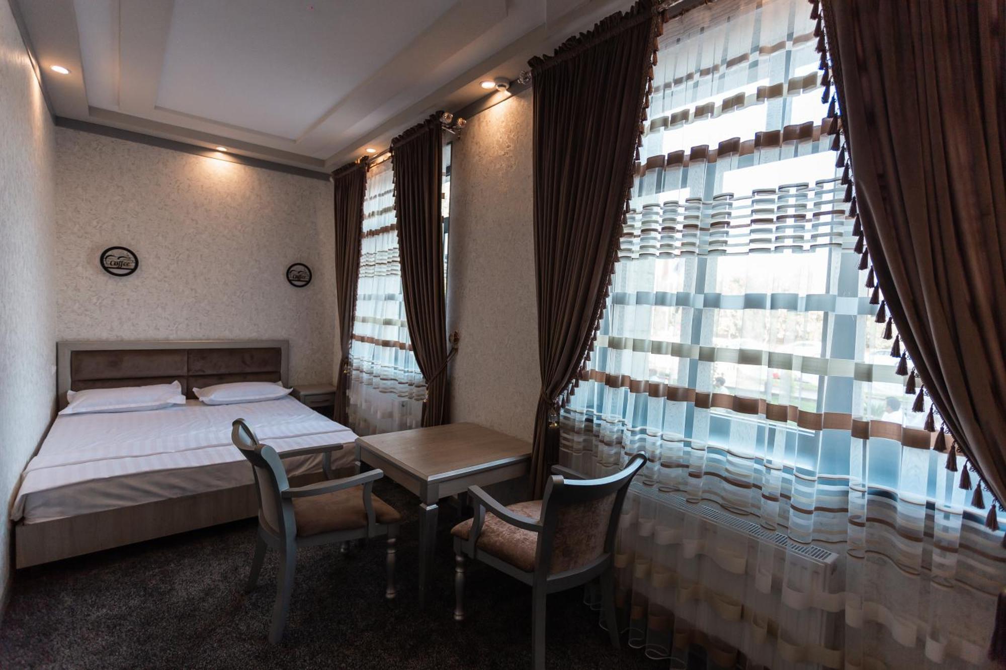 Diyor Hotel Marghilon Eksteriør bilde